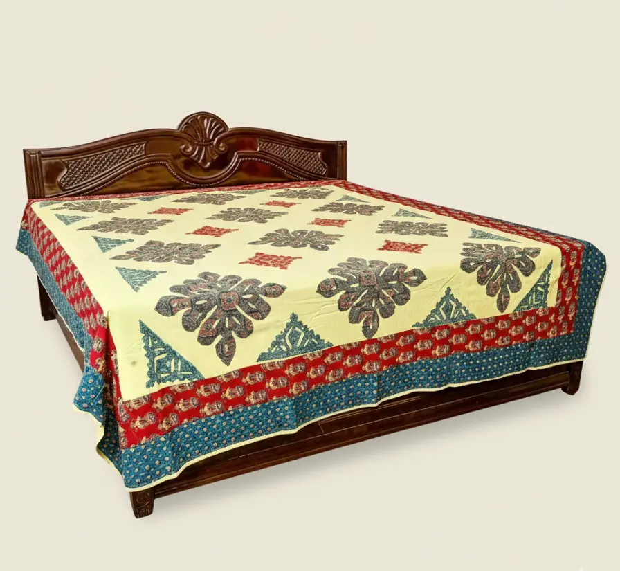 Decorative bedspread with floral patterns on a wooden bed 
